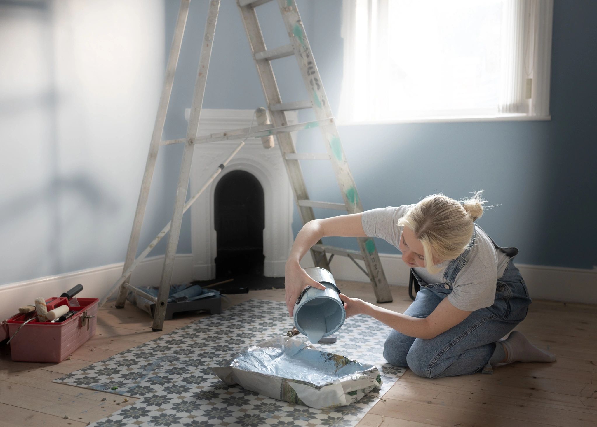 Artist working with paint in a studio setting