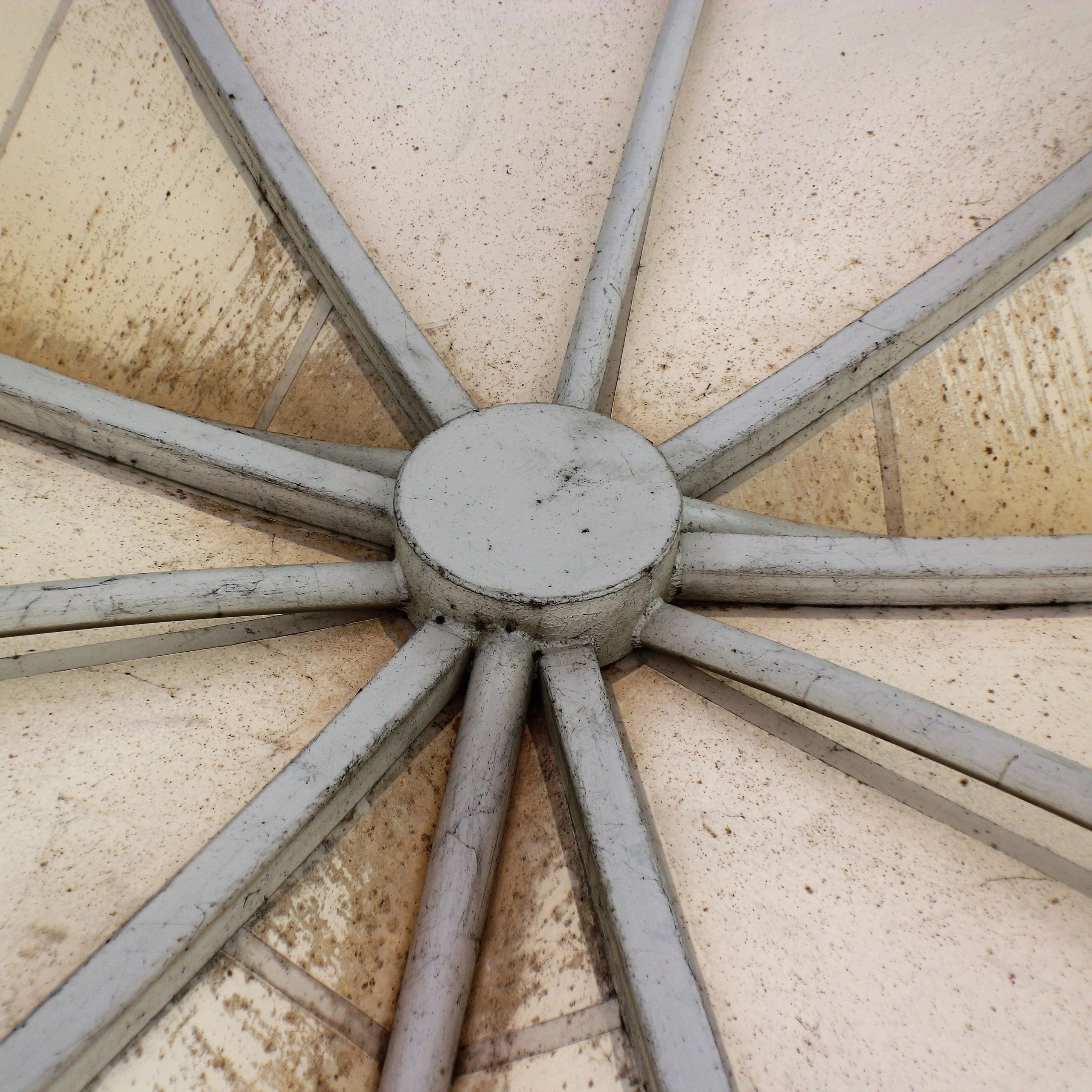 Circular structural composition suggesting found-object sculpture